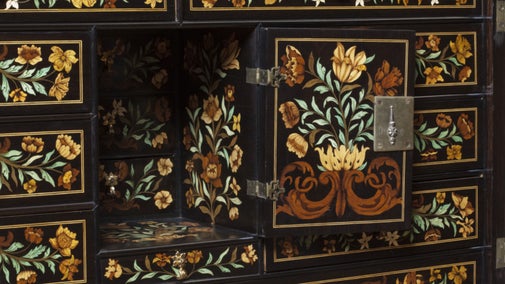Close view of ebony inlaid cabinet c1675 with floral marquetry in the Long Gallery at Ham House, Richmond-upon-Thames